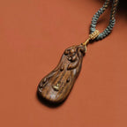 "Formless Buddha" · Sandalwood Carving Necklace (Guardian)